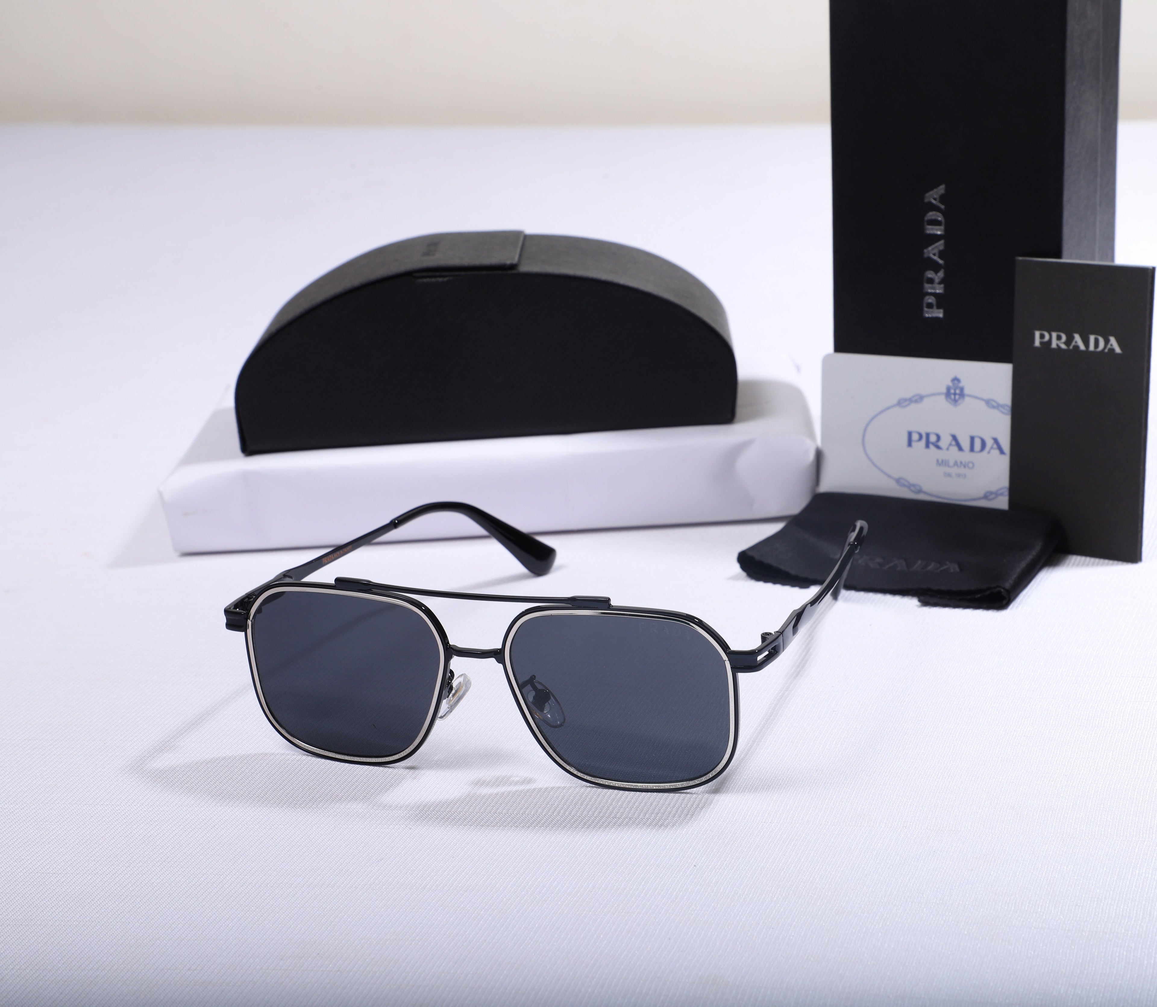 PRADA Modern Geometric Sunglasses with Case