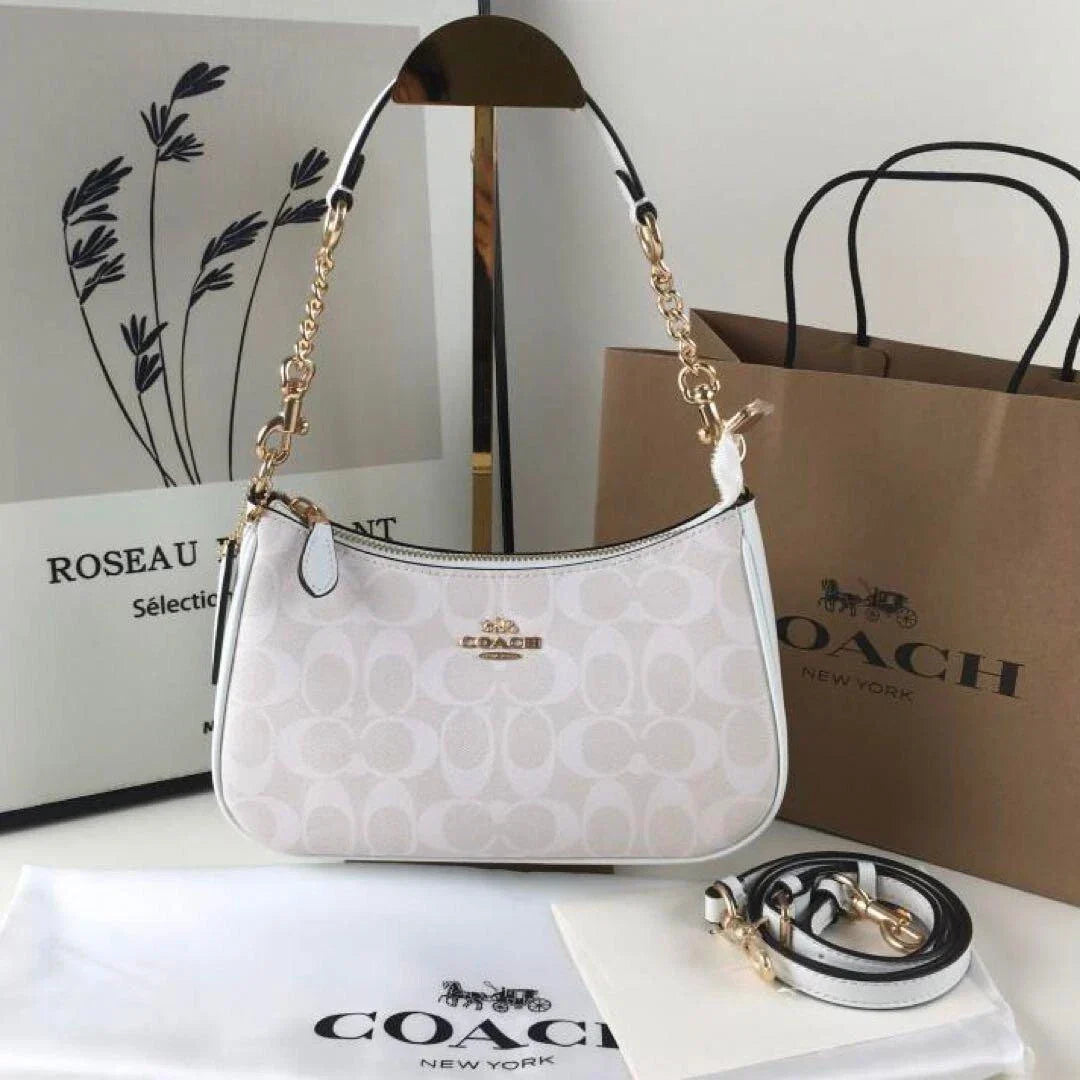 COACH Serene Blush Elegant Hobo Bag with Opulent Chain Detail