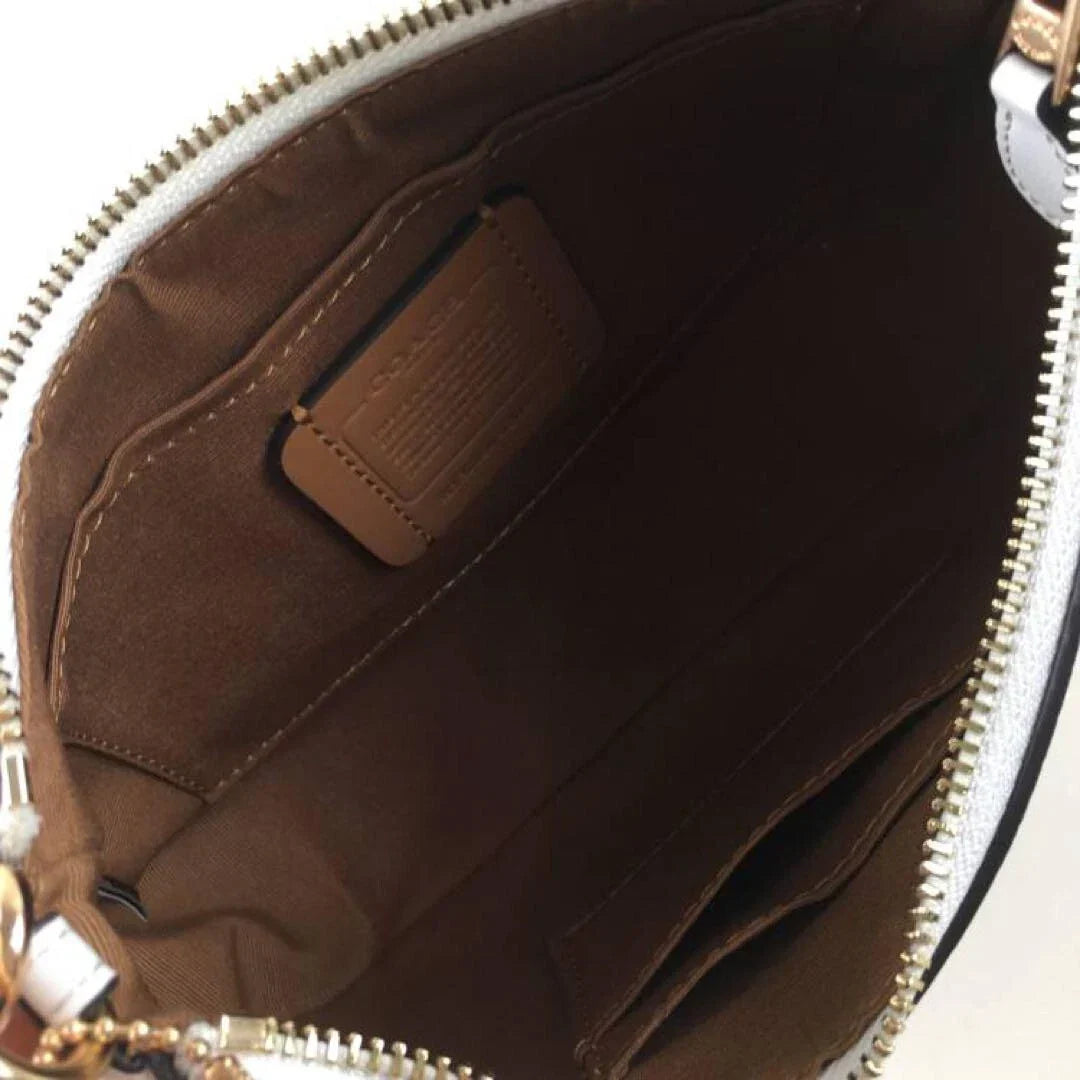 COACH Serene Blush Elegant Hobo Bag with Opulent Chain Detail