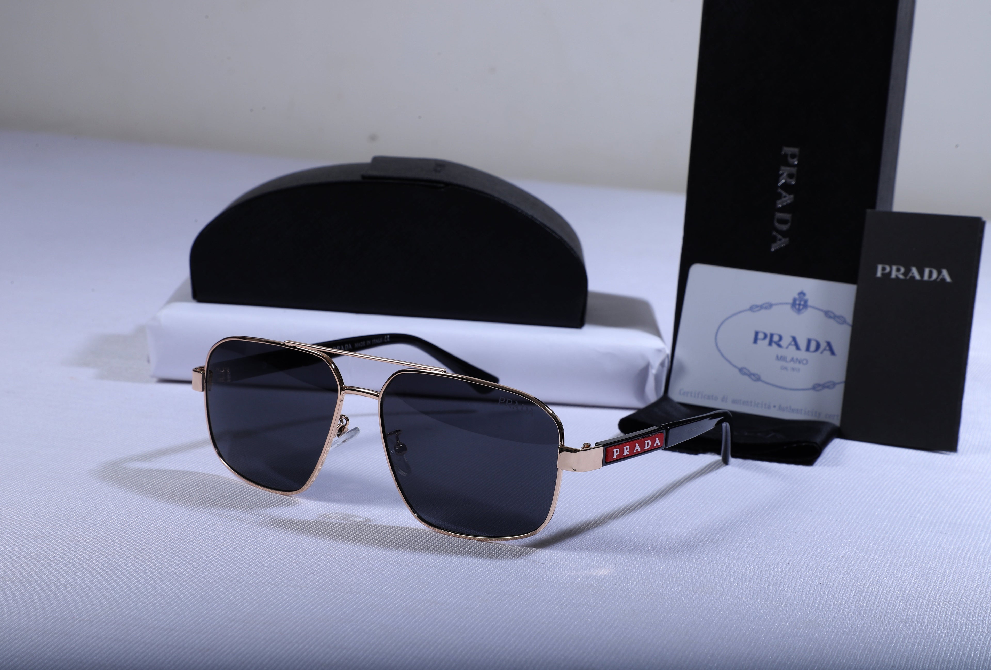 PRADA Radiant Onyx Premium Aviator Sunglasses with Gilded Frame