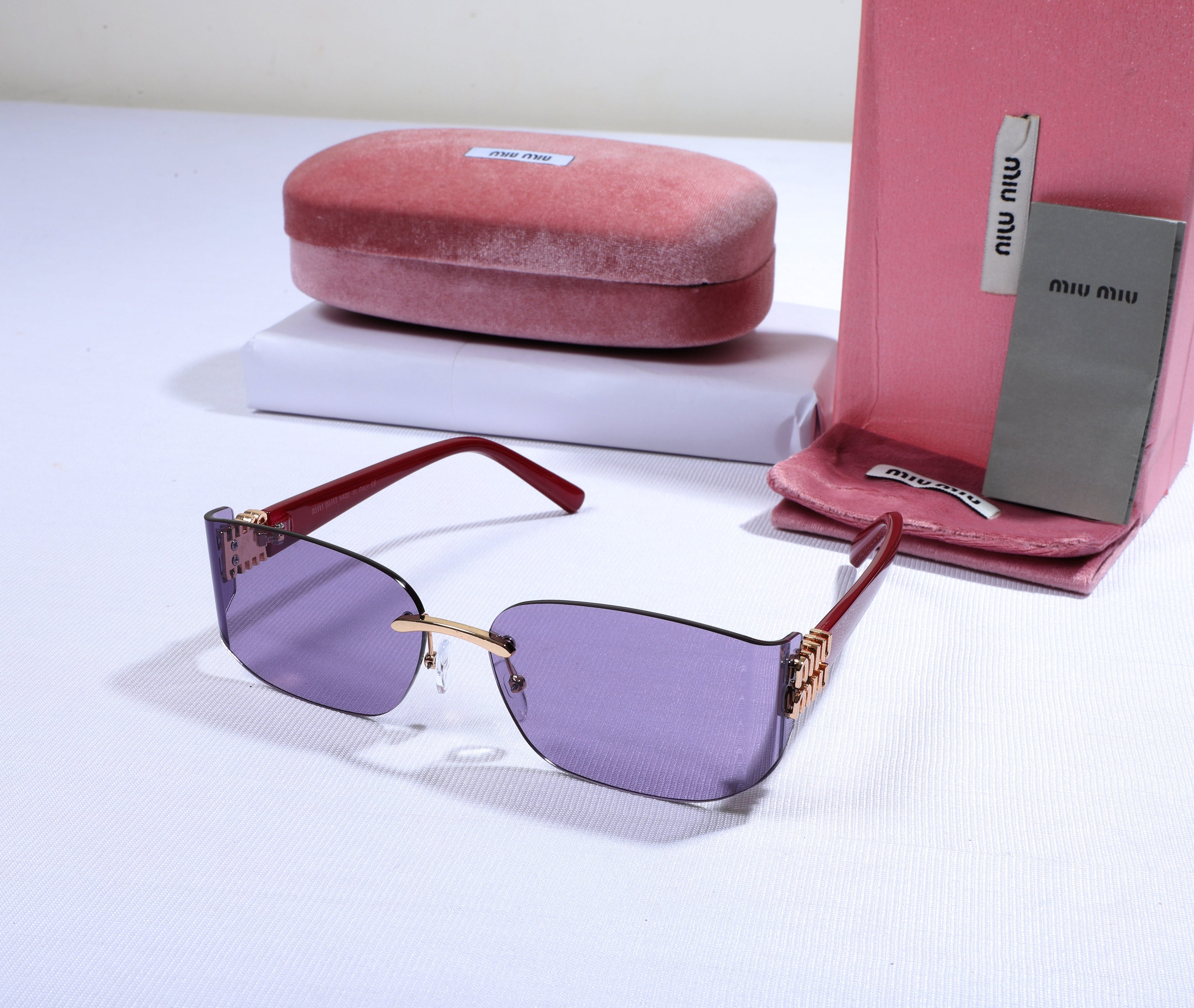 MIU MIU Radiant Lavender Bold Fit Oversized Sunglasses with Garnet Highlights